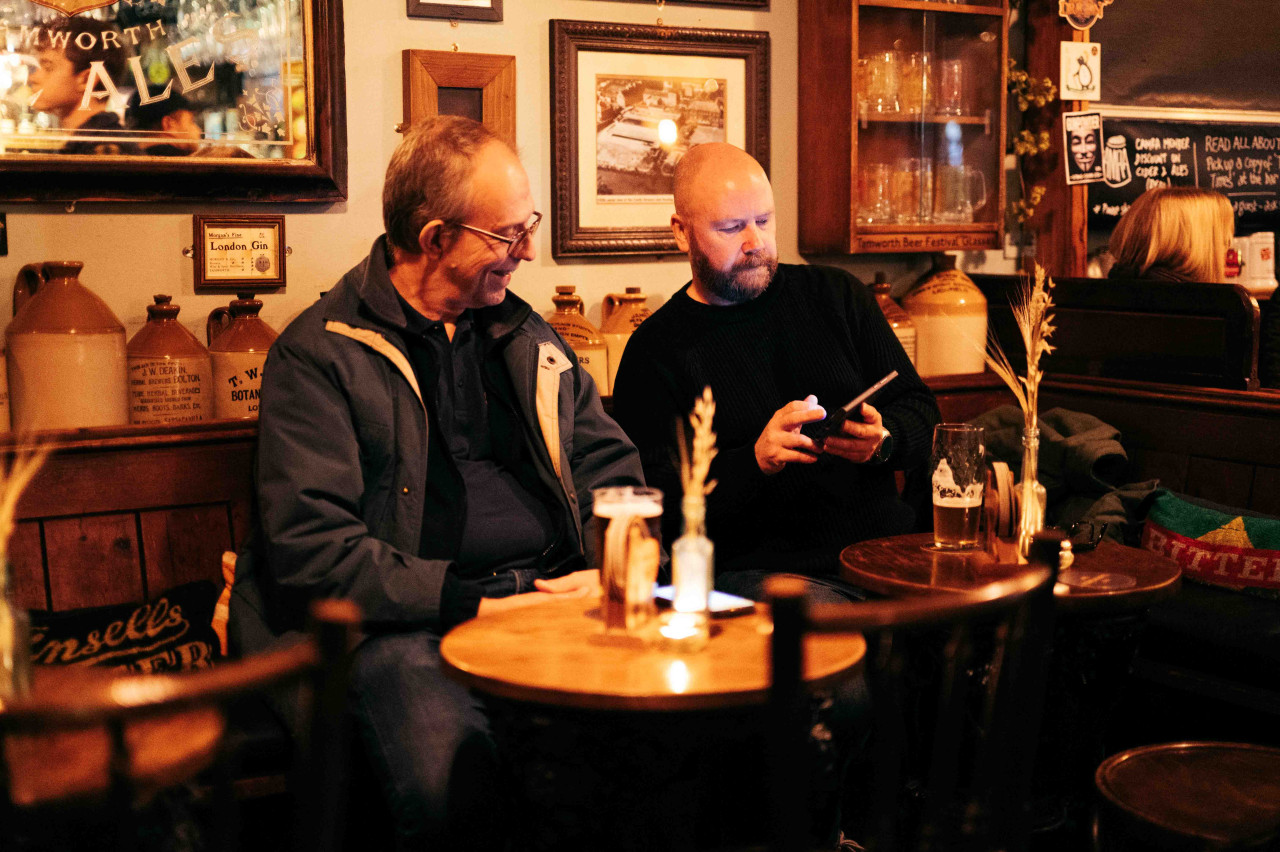 Two CAMRA members having a pint